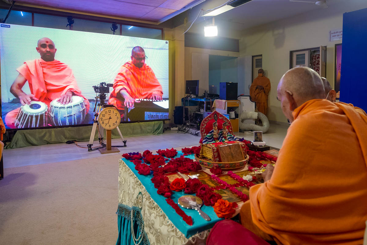 Sadhus sing kirtans via video conference from Australia