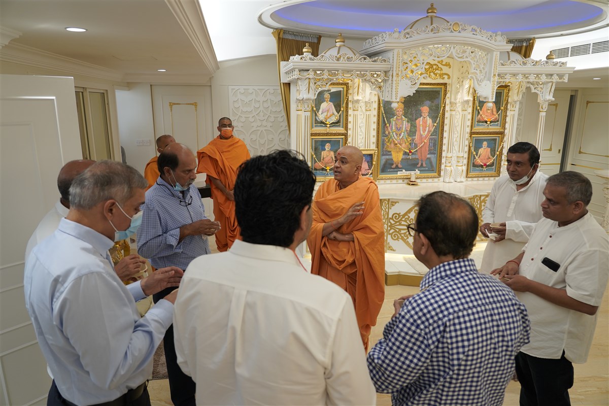 Sadhu Brahmaviharidas and Community Leaders discuss the ongoing relief work