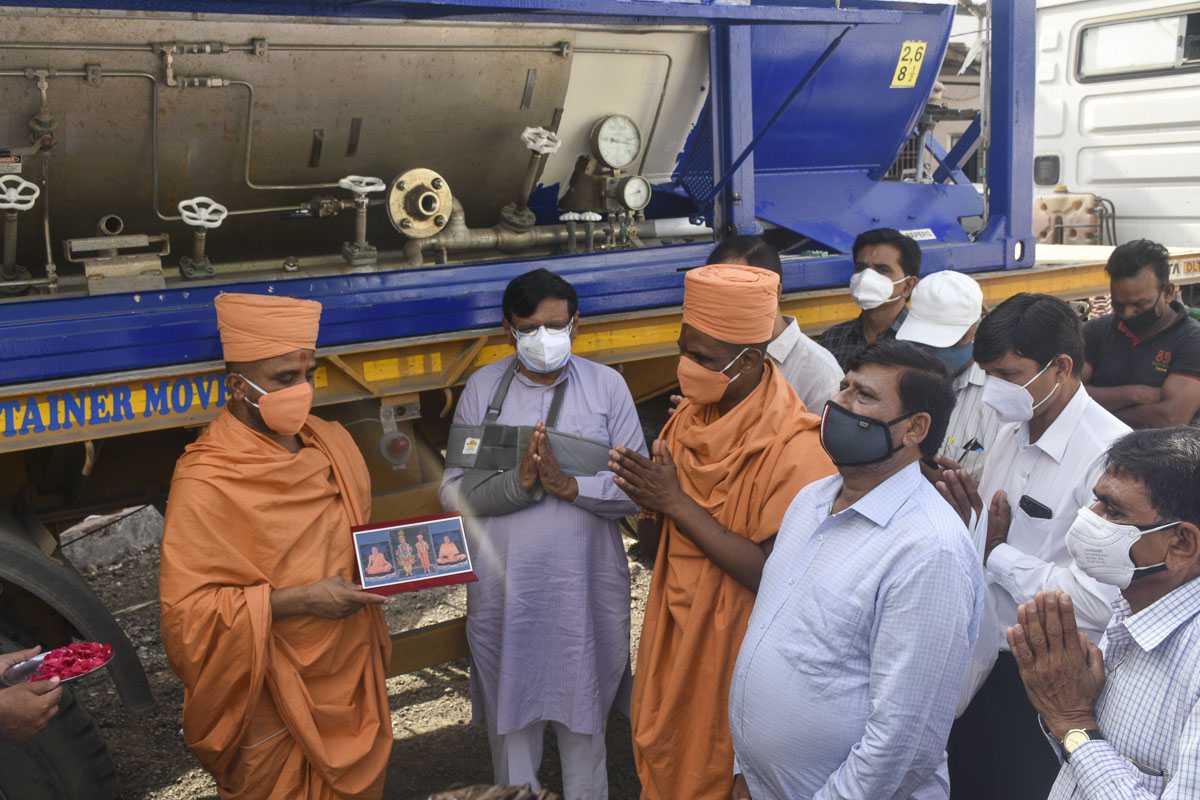 Sadhus and community leaders pray for the well-being of all