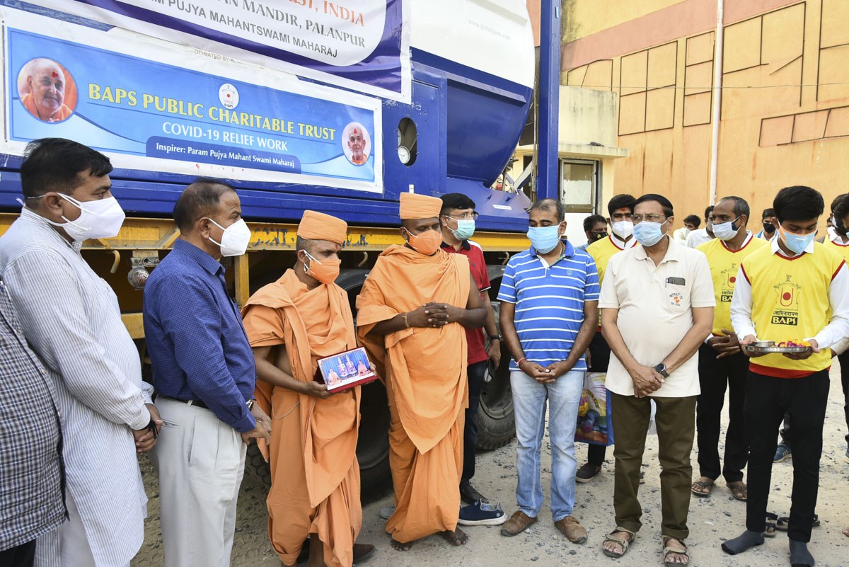 Sadhus and community leaders pray for the well-being of all
