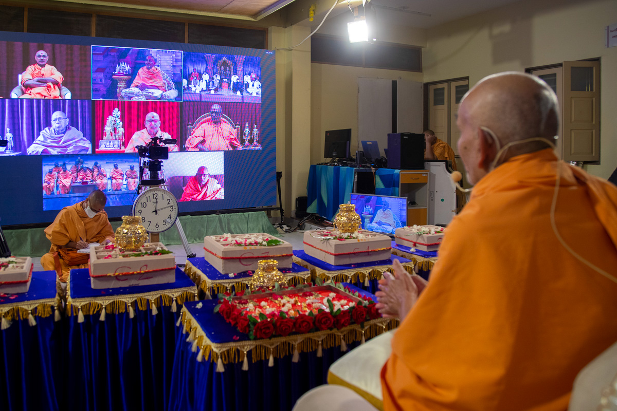 Senior sadhus, sadhus and devotees participate in the assembly via video conference