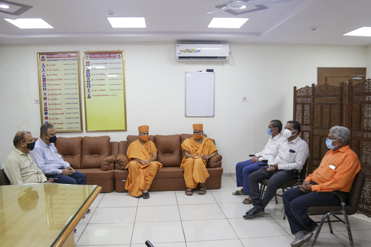 Sadhus with hospital officials