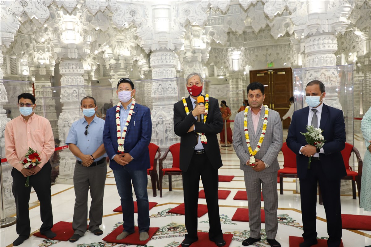 Nepalese Ambassador and delegation offer prayers for the peace and good health of the people of Nepal