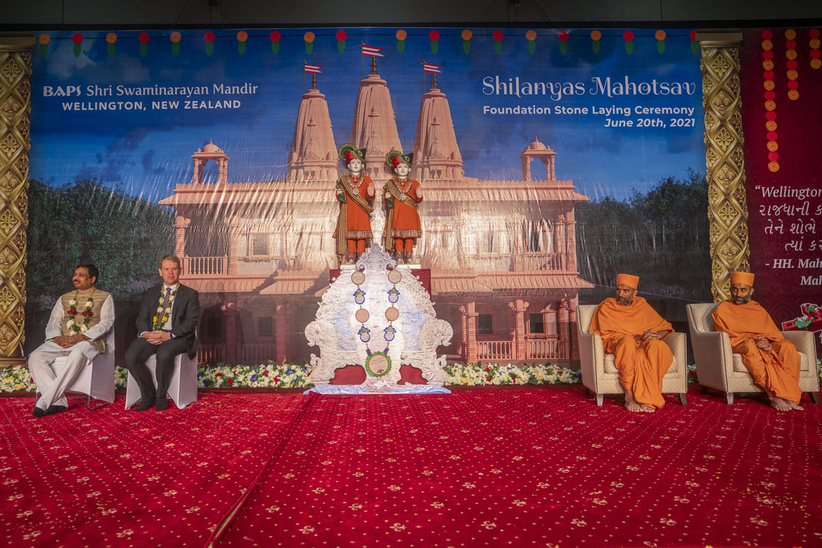 Sadhus and dignitaries on the stage during the assembly