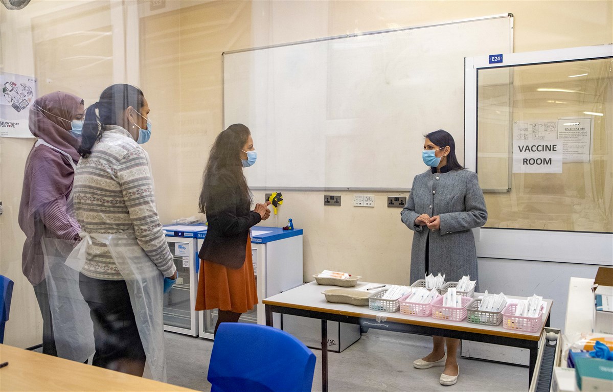When meeting the NHS healthcare professionals and members of the Army, the Home Secretary said she was “delighted to be here today to see the heroic efforts around the vaccination programme”