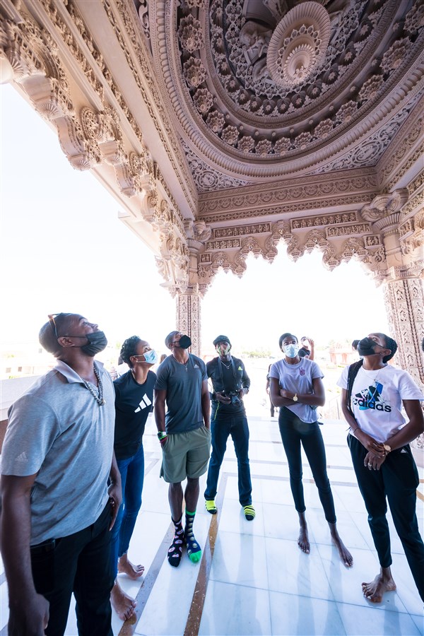 Members of the Jamaican Olympic Track Team marvel at the Mandir’s architecture