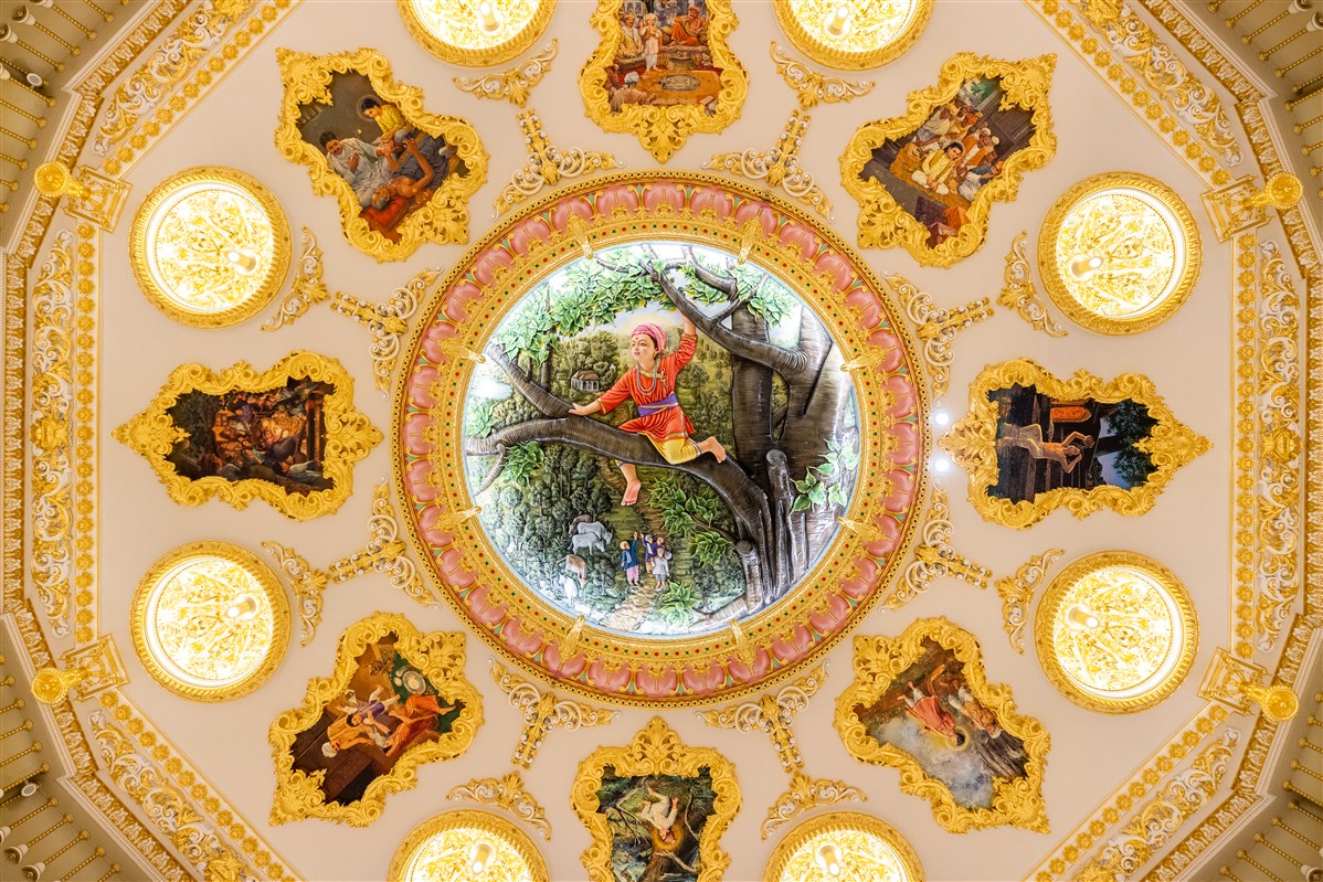 A decorative ceiling dome depicting events from Shri Ghanshyam Maharaj's life