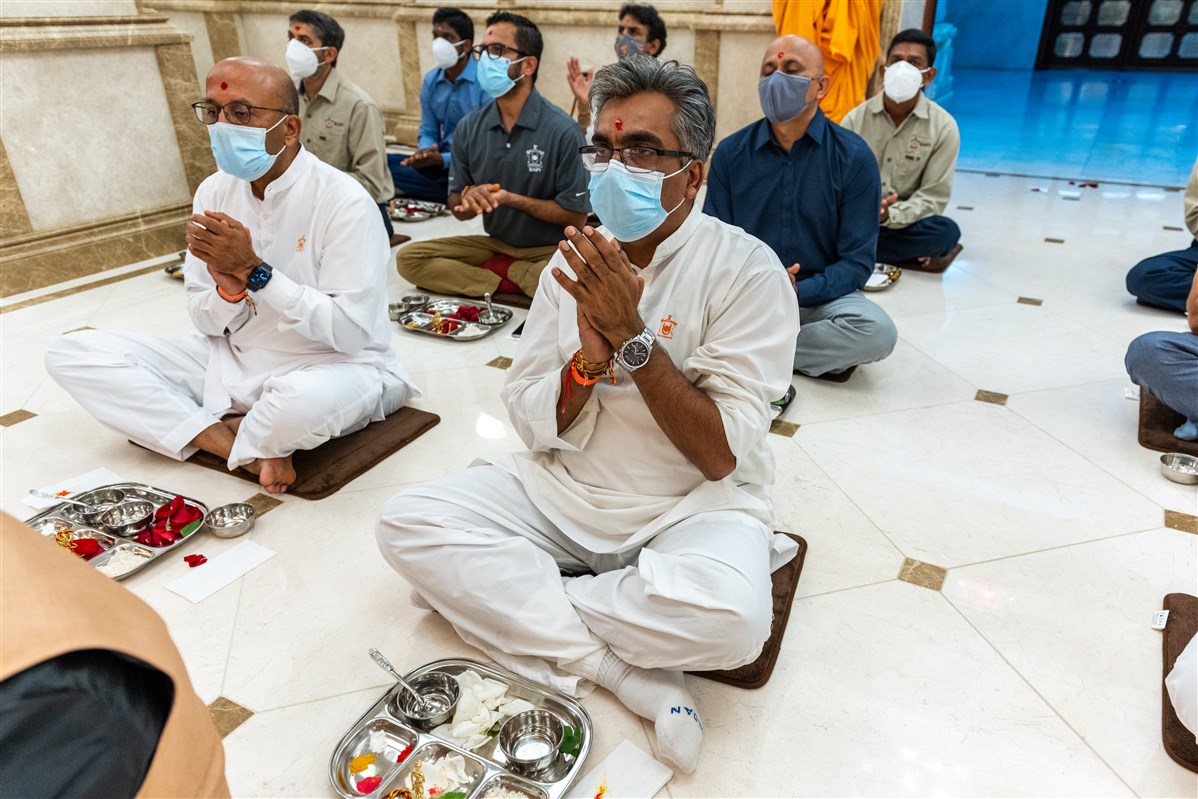Devotees engaged in the rituals