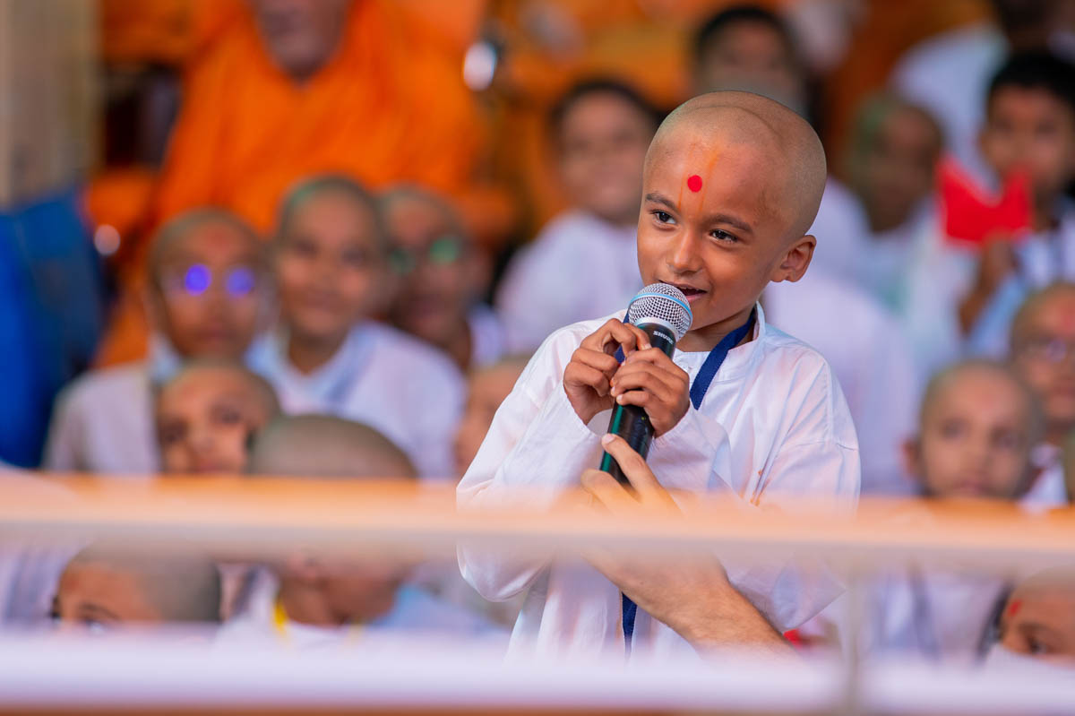 A balak presents before Swamishri