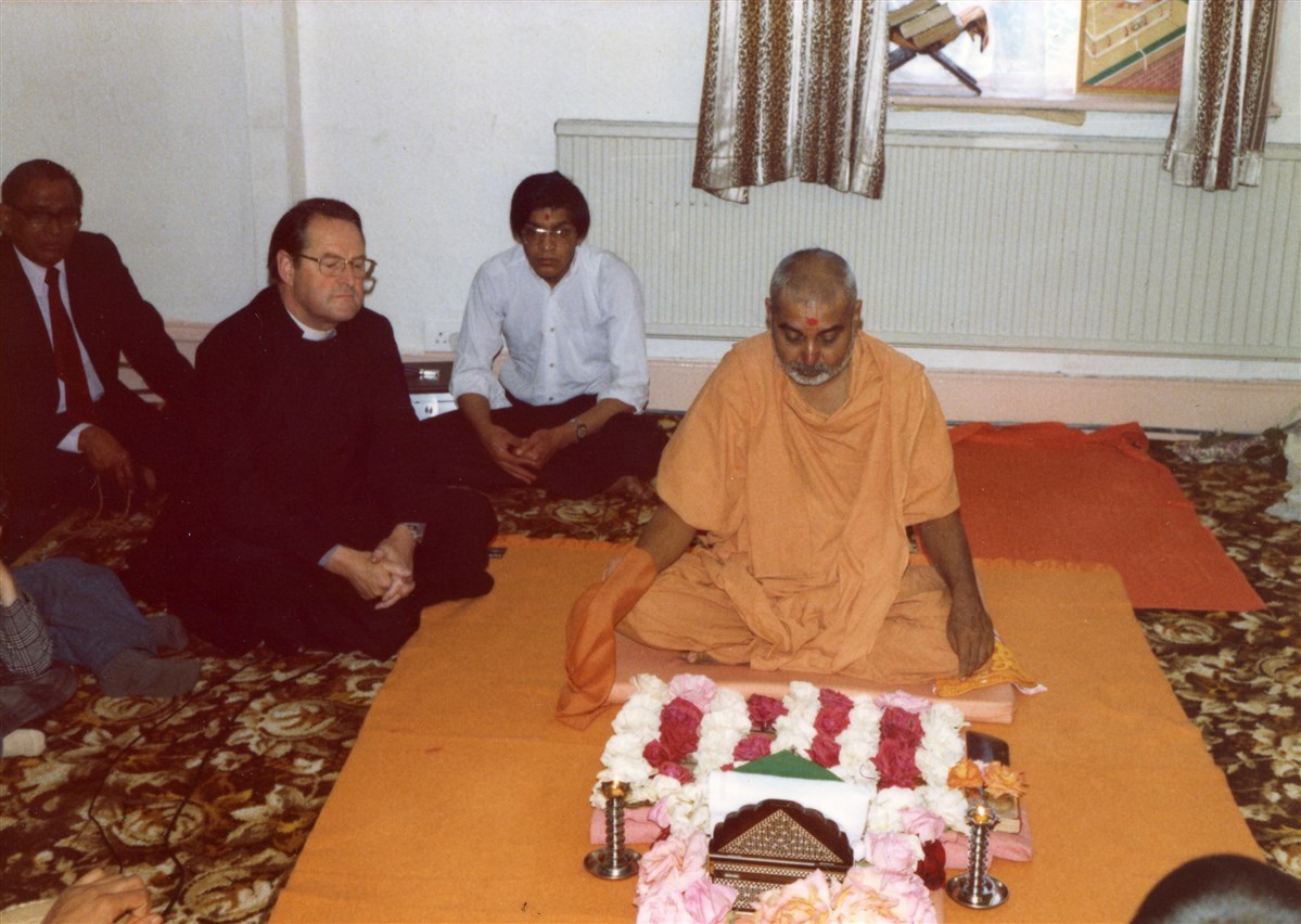 Pramukh Swami Maharaj performing his morning puja during his second visit to Ashton-under-Lyne, in 1977