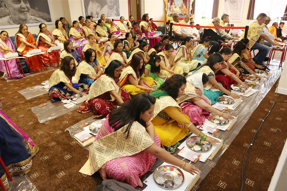 Devotees participate in the mandir's 20th anniversary patotasv ceremony
