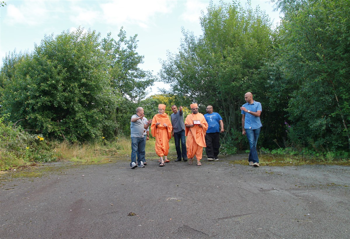 On 15 August 2015, Mahant Swami Maharaj visited the newly acquired site in Manchester to bless the land and pray for the new mandir