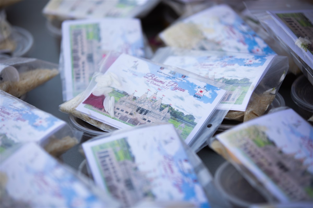 The puja pack contained flower petals, rice and soil from the site