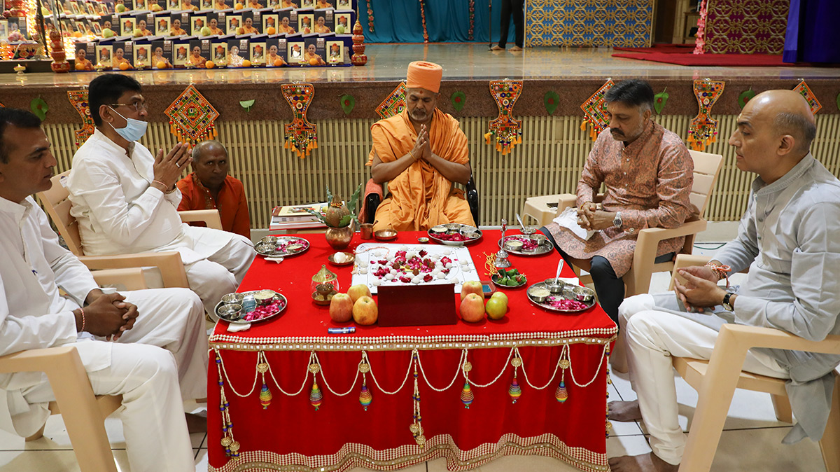 Sadhus and devotees participate in mahapuja rituals