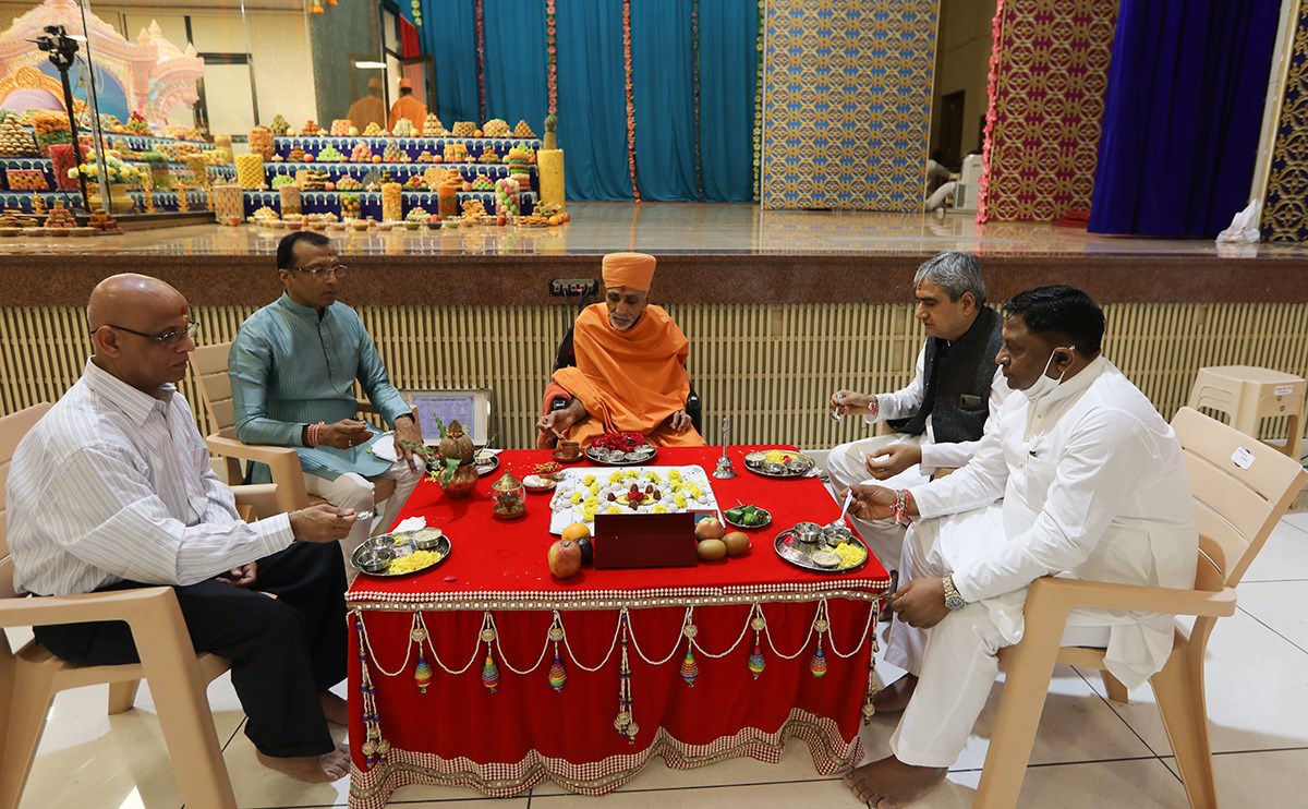 Sadhus and devotees perform the mahapuja rituals