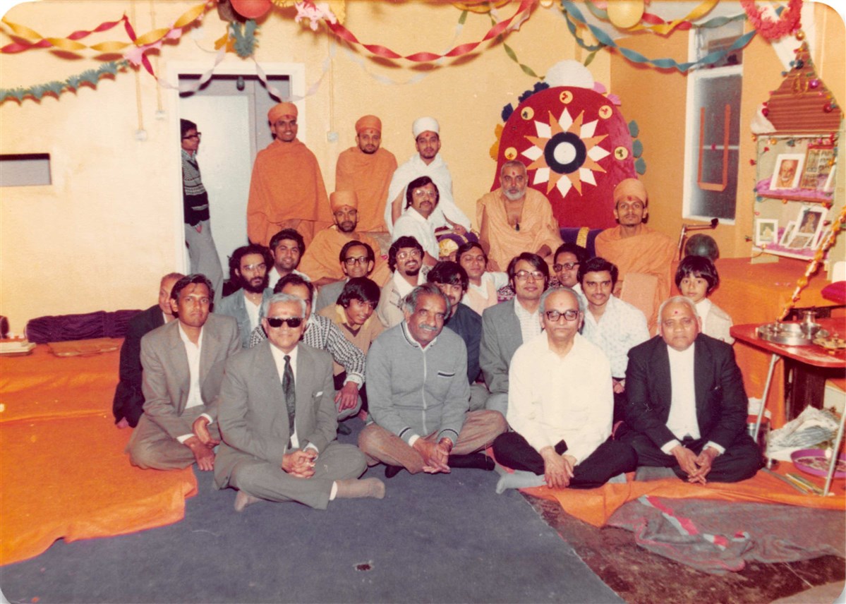 Pramukh Swami Maharaj graced Birmingham for a second time, in 1977, seen here with Mahant Swami, other swamis and several local devotees
