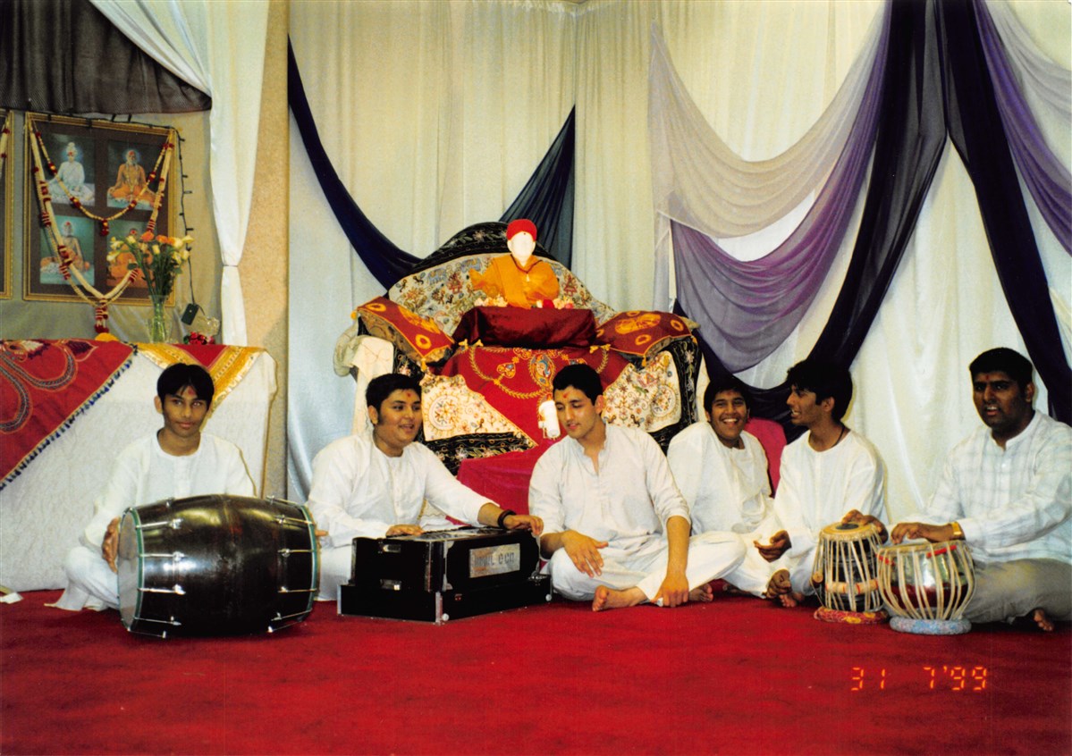 Youths engaged in devotional programmes at the Satsang Bhavan during the 1990s