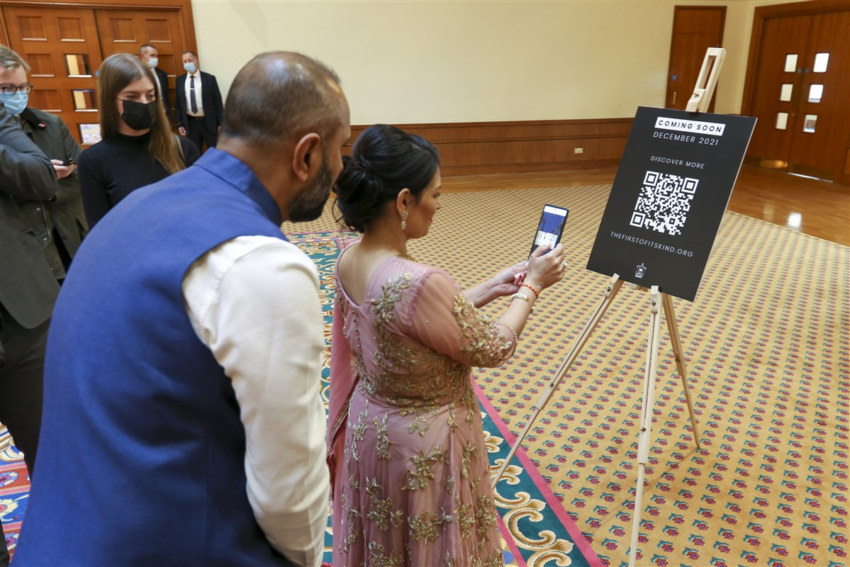 The Home Secretary scanned a QR code to join a special <a href='https://t.me/TheFirstofitsKind' target='blank' style='text-decoration:underline; color:blue;'>communication channel</a> for an upcoming documentary series about the Mandir