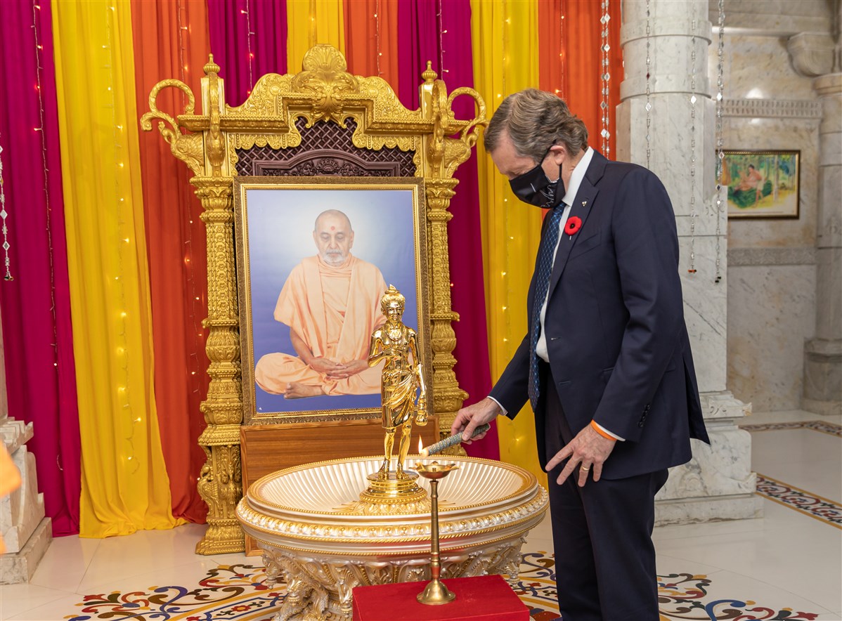 His Worship John Tory, Mayor of Toronto, lighting the Diya