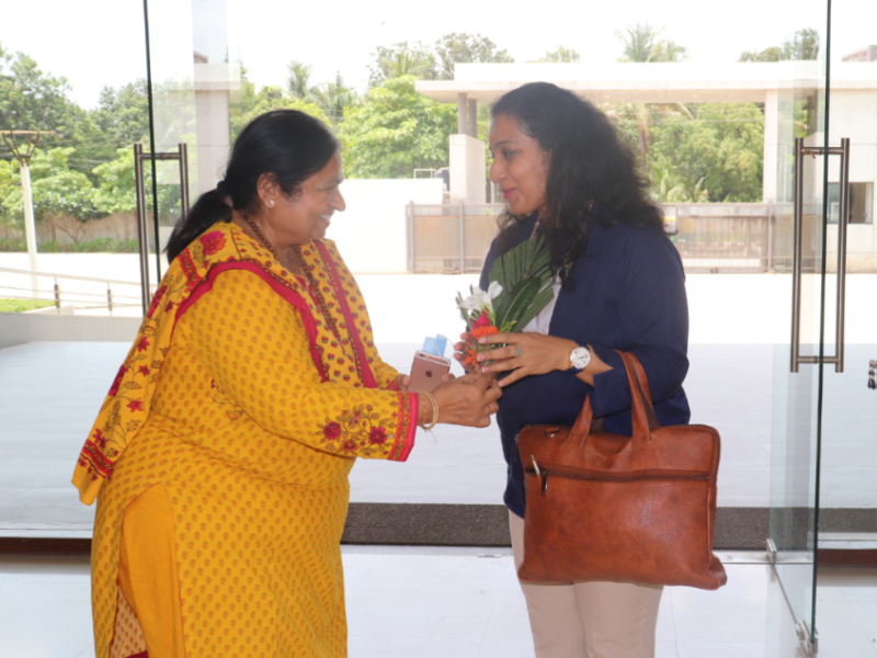 Ms. Anjali Choksi being welcomed by Campus Director Dr. Neeta Shah