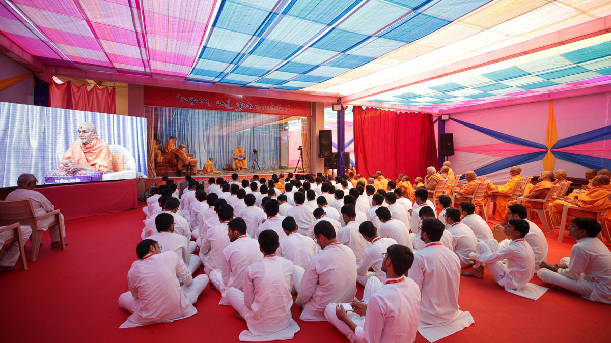 Sadhus and youths during the assembly