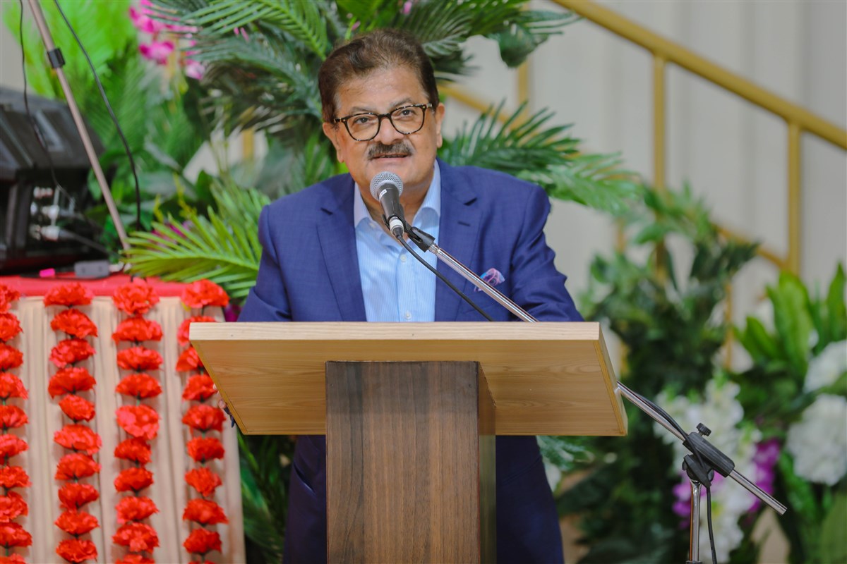 Ashokbhai Kotecha welcomes guests and shares prayers on the auspicious occasion