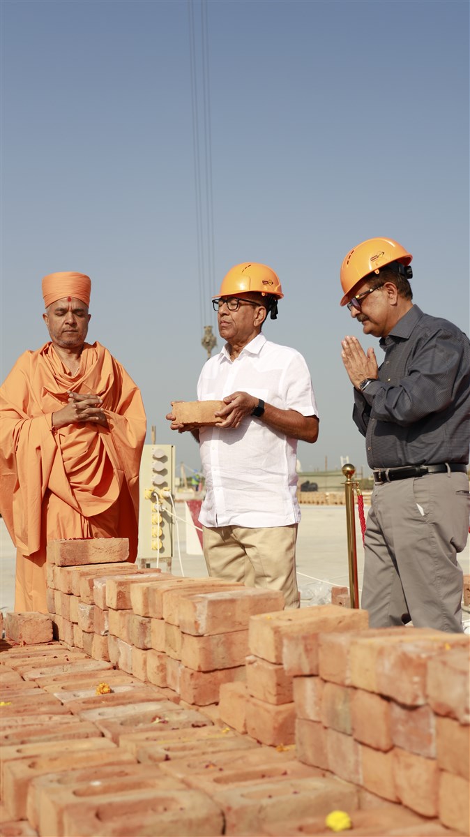 Shri Vinodbhai Adani places a brick on the mandir