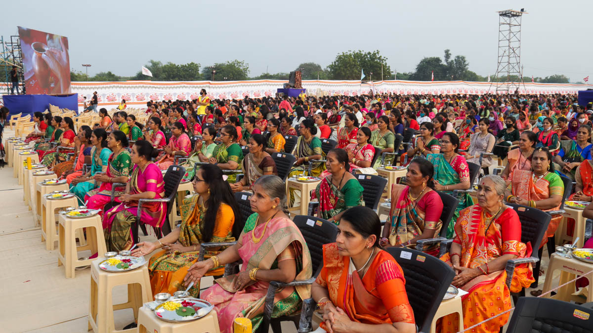 Mothers of sadhaks engaged in mahapuja rituals