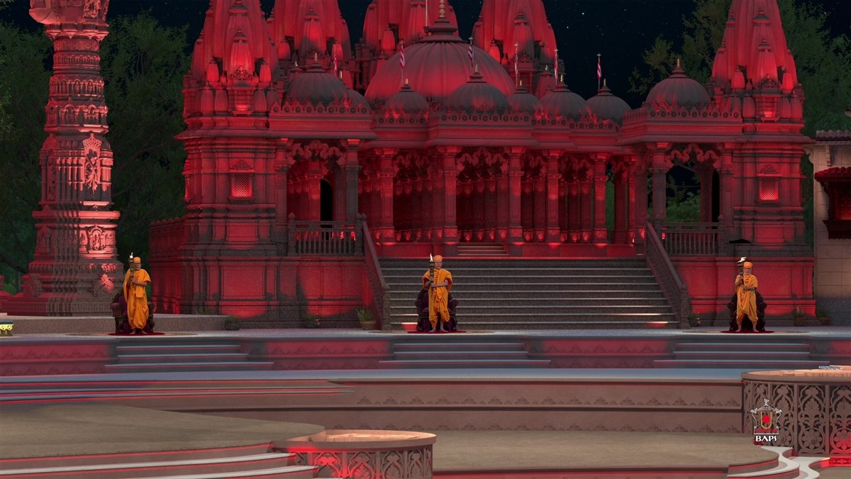 Senior sadhus hold flame torches