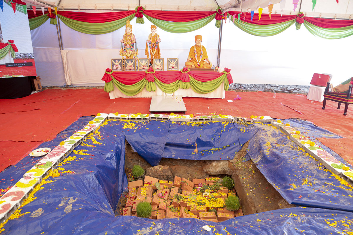 The mandir foundation pit with the nidhi kumbh and shilas placed