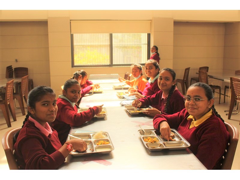 students enjoying with delicious food
