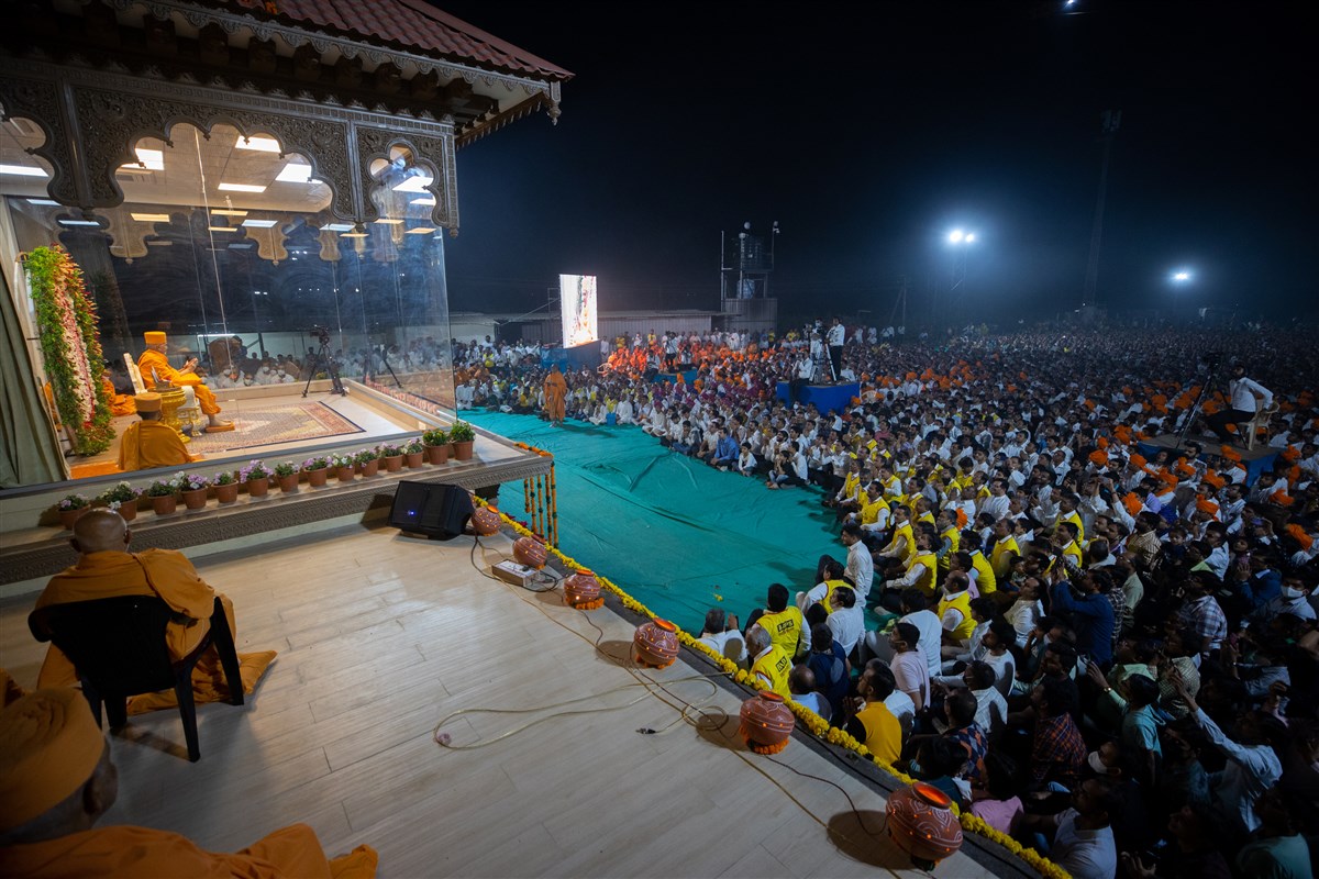 Sadhus and devotees during the welcome assembly