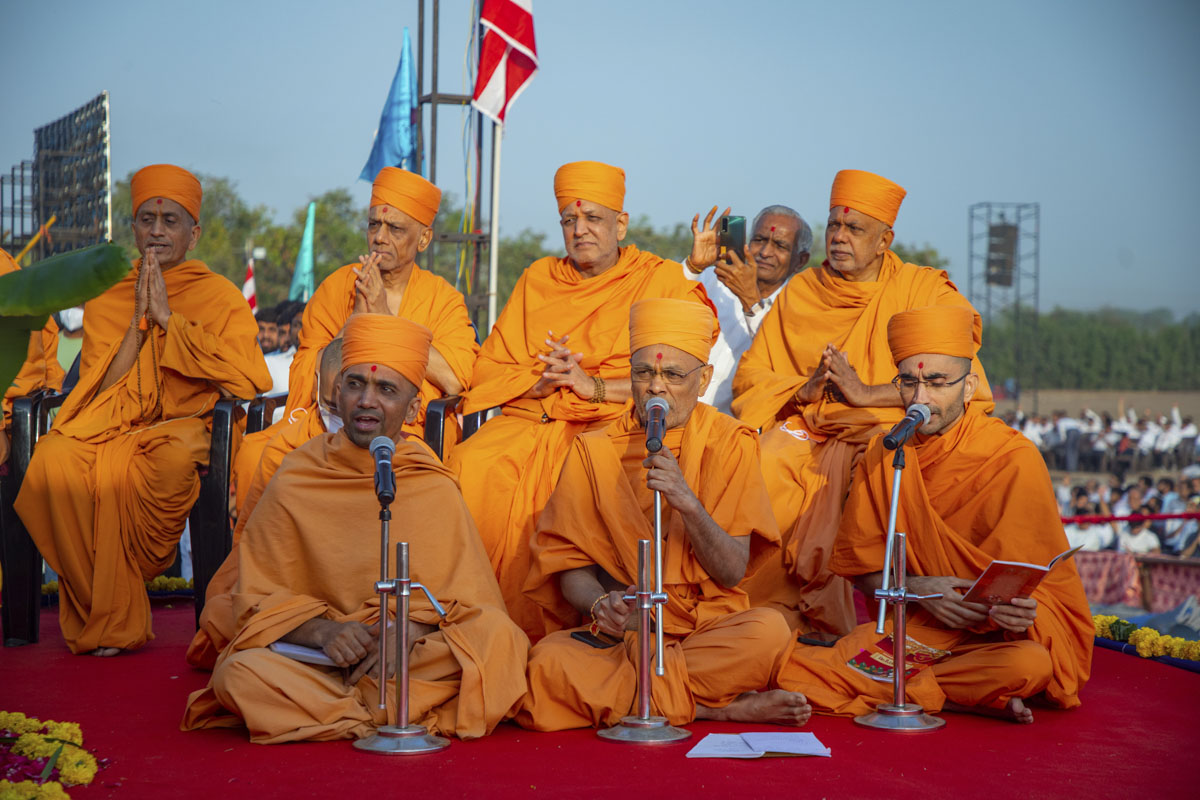 Sadhus recite Vedic verses during the pujan ceremony of the first pillar