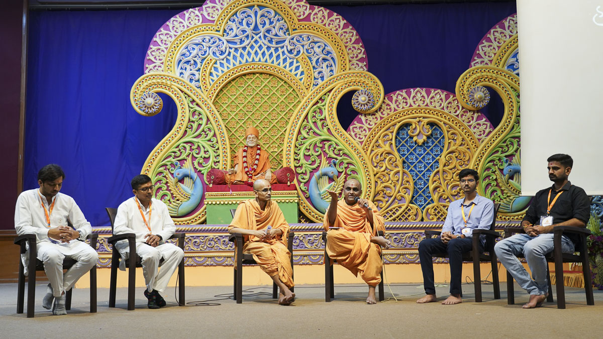 Sadhus and students during a group discussion