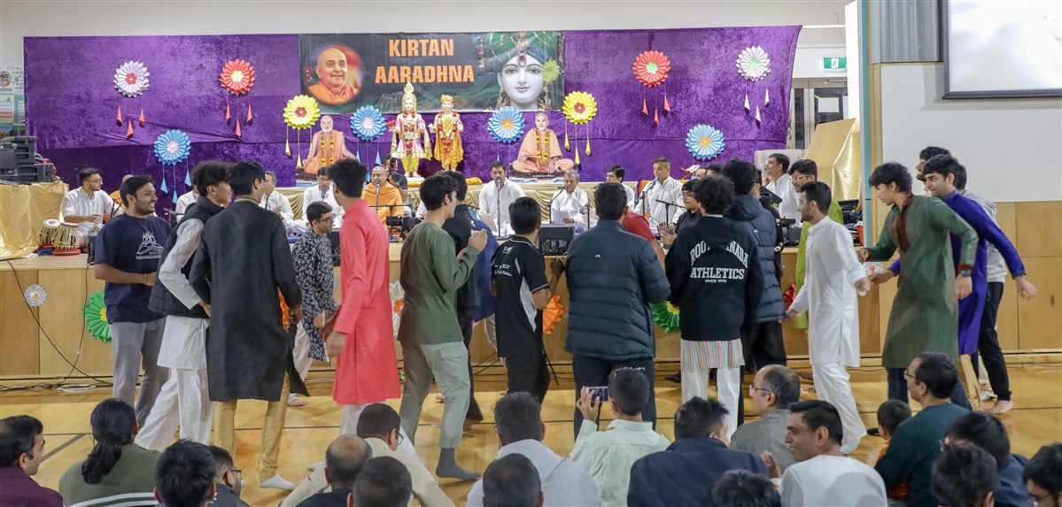 Youths rejoice during kirtan aradhana