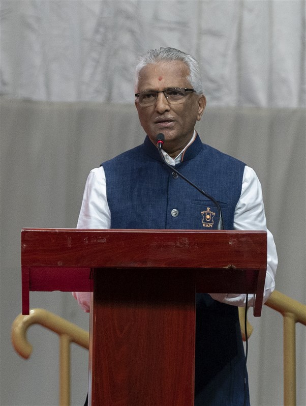 Religious discourses being delivered by a devotee