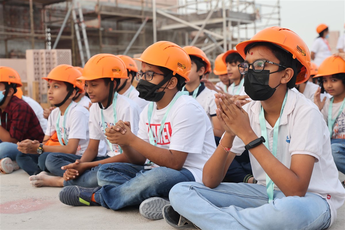 Children enjoying their mandir under construction