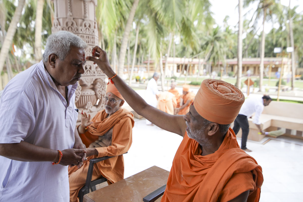 Sadhus welcome devotees