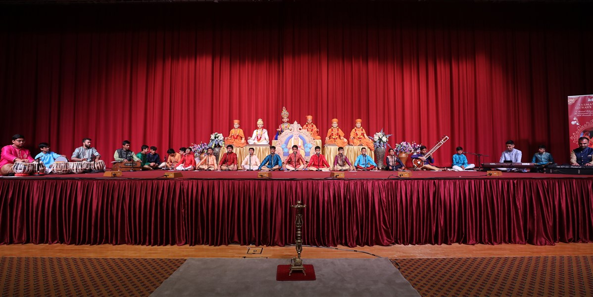 The assembly began with children from around the UK performing a musical tribute to His Holiness Pramukh Swami Maharaj in commemoration of his centennial birth anniversary