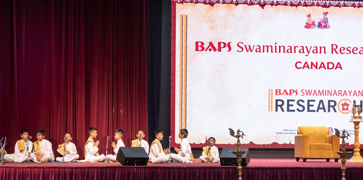 A choir of children singing the Shanti Path, a Vedic peace prayer in Sanskrit