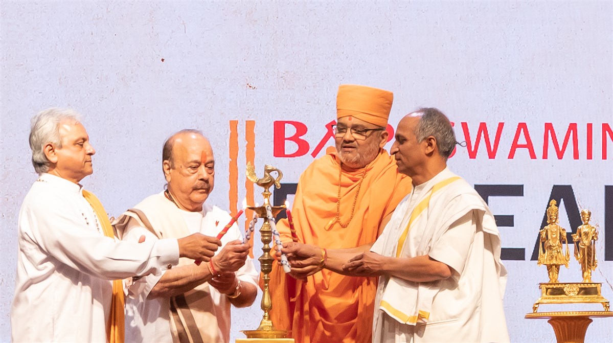 Representatives of Hindu Mandirs and organizations ceremoniously light the lamps