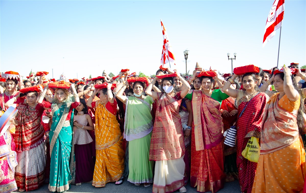 The women's wing participates in a 'Pothi Yatra,' a religious procession honouring the holy scriptures