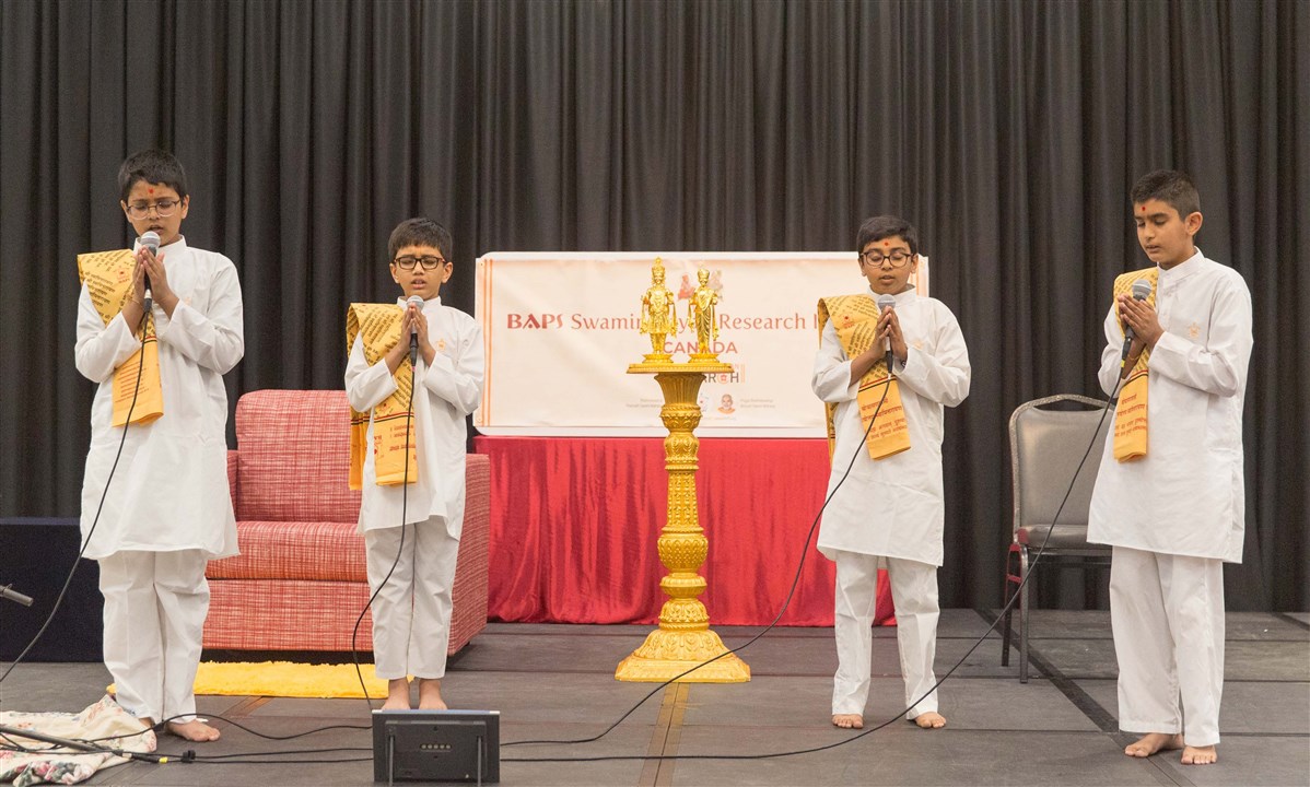 Children singing the Shanti Path, a Vedic peace prayer in Sanskrit