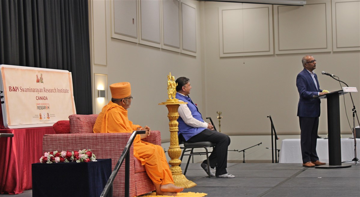 Chandra Arya, Member of Parliament for Nepean addresses the assembly