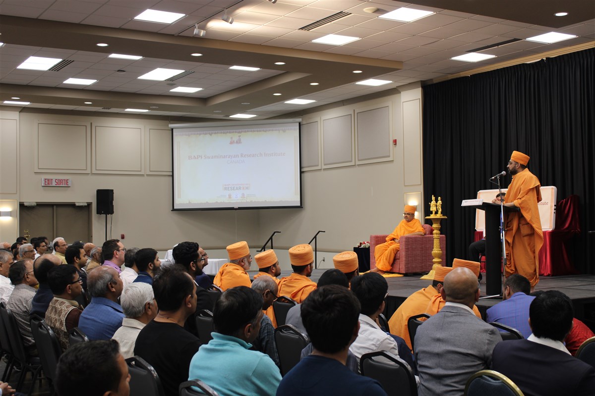 Pujya Gunsagardas Swami, Head of the BAPS Canada, addresses the assembly