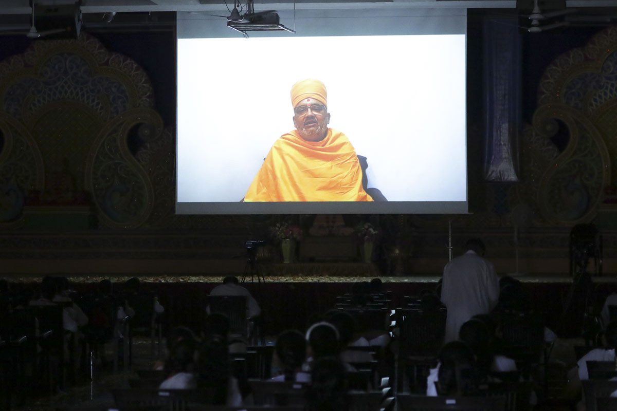 Bhadresh Swami addresses the assembly via video conference