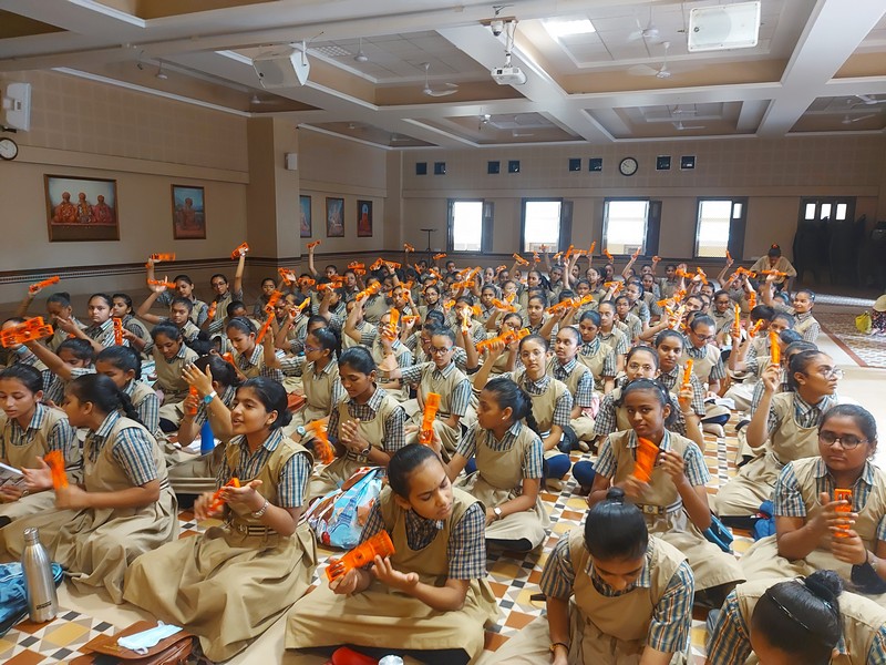 Students engaged in kirtan bhakti at Amli Vali Pol