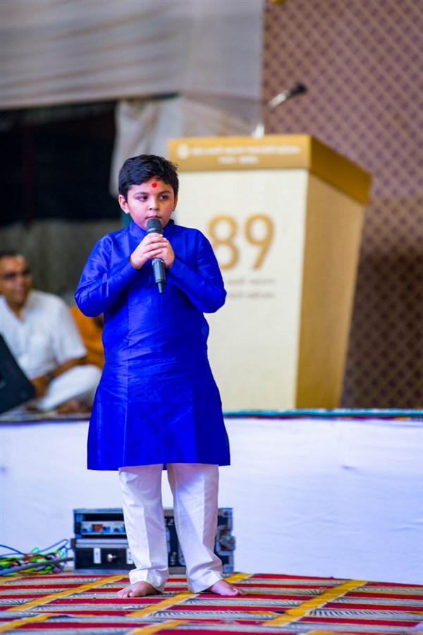 A child presents in the assembly