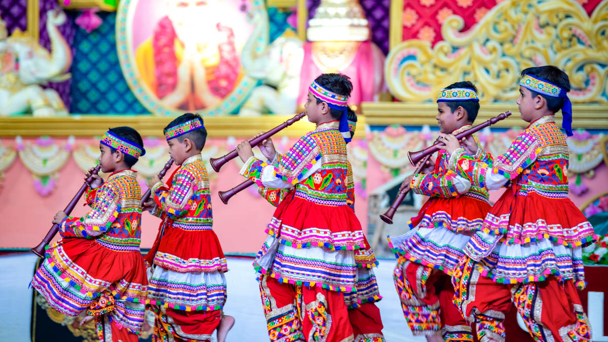 Children present a traditional dance