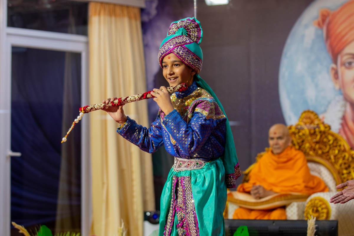 A child performs a traditional dance